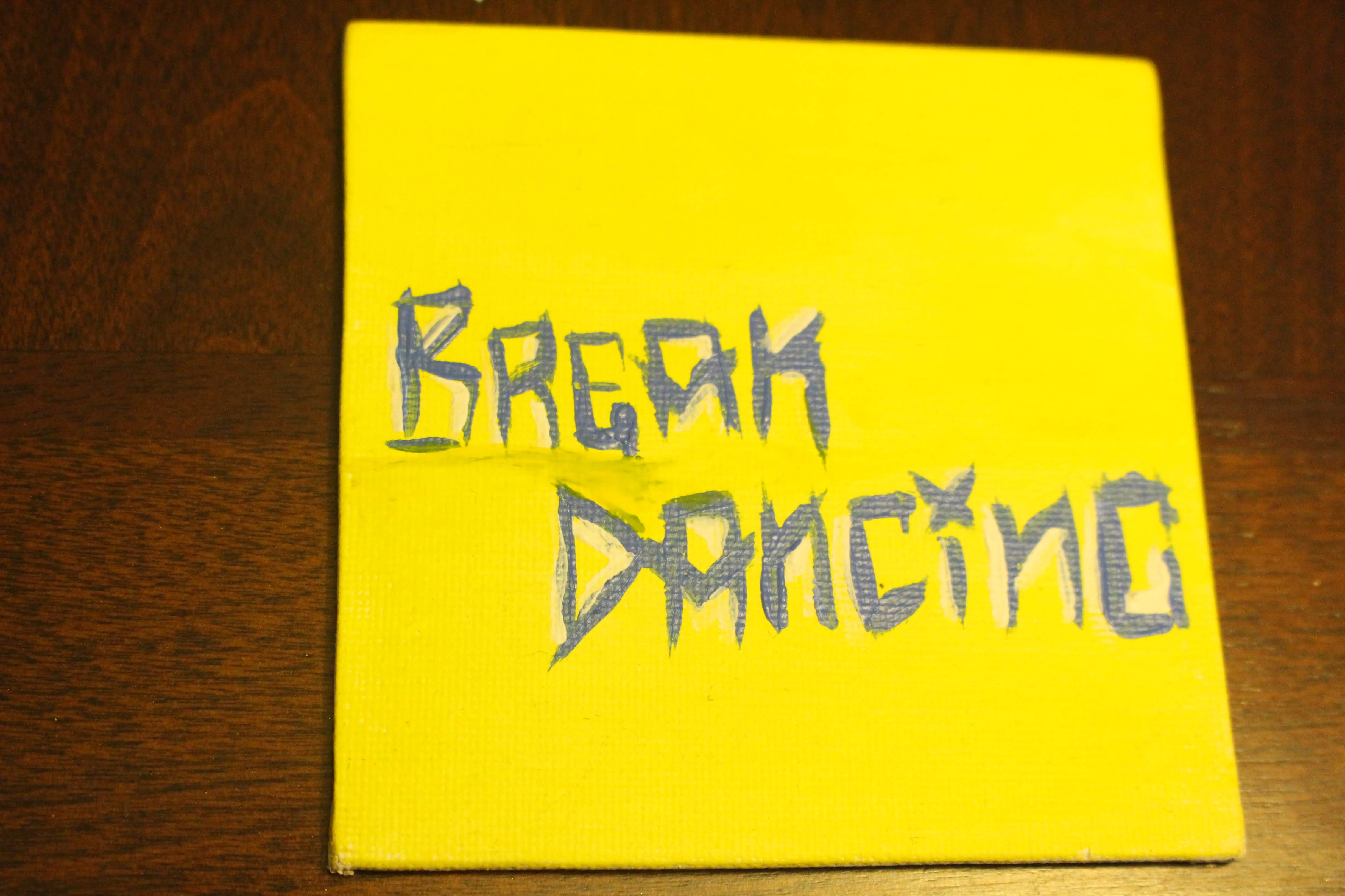 This is a painting of the word ‘break dancing’ on a mini canvas. This word represents one of the ‘four elements of hip hop”.