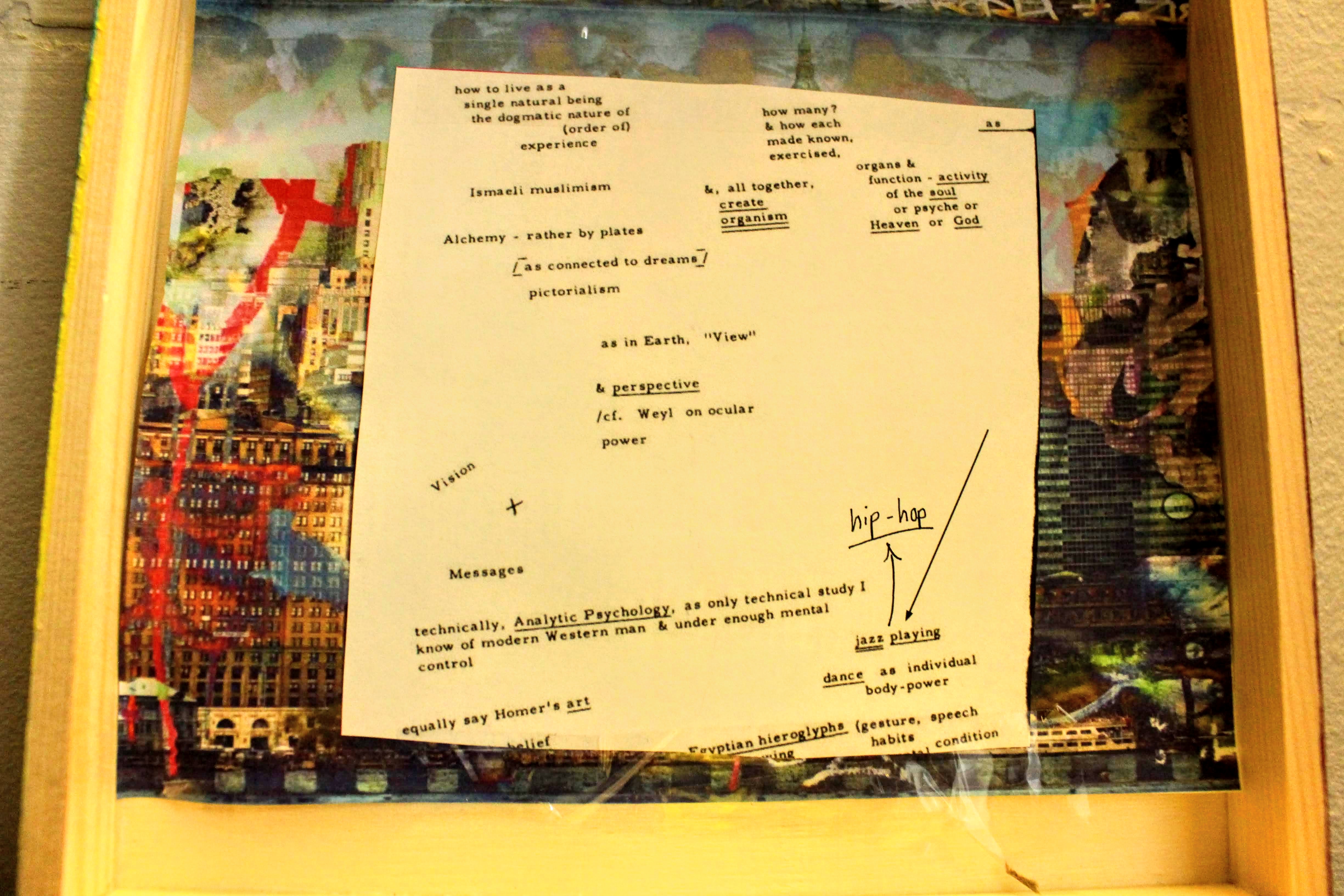 The upper part of the inside of the box. Includes a cutout of Prospero’s ‘Graffiti City’. Placed on top of the cutout is the a piece of Charles Olson’s “A Plan for the Curriculum of the Soul”. Here, I drew an arrow pointing away from the term ‘jazz playing’ and wrote the term ‘hip-hop’ with a pigment liner.